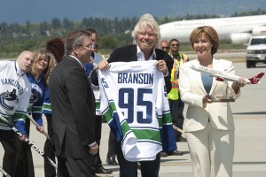 Sir Richard Branson (centre) was welcomed by Larry Berg, Vancouver Airport president and CEO and B.C. premier Christy Clark in May 2012 as Virgin began direct Vancouver-London summer seasonal service, which returns to YVR for the 2013 summer season.