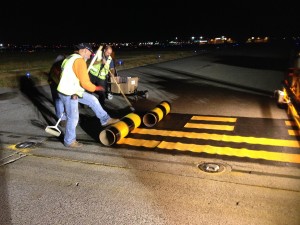 New thermoplastic markings are installed at one of the main taxiways on YVR's South Runway.