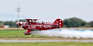 Former Canadian Snowbirds pilot Brent Handy flying a Pitts S-2b with some effect. Designed by Curtis Pitts in 1944, the Pitts Special is a light aerobatic biplane. Photo: Jim Jorgenson